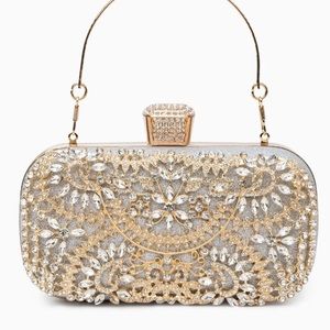 Beautiful silver clutch gold accents - brand new never used